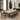 Dining room setup with a table and chairs in a stylish interior setting.