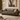 Gray sofa in a living room with abstract art and 'MOHKAM' branding.