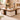 Wooden coffee table with decorative items in a living room setting