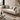 Beige sofa with wooden frame in a living room setting, featuring 'mohkam' branding.